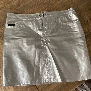 D&G vintage mini skirt. Preowned. Color: silver. Size 26 (XS)